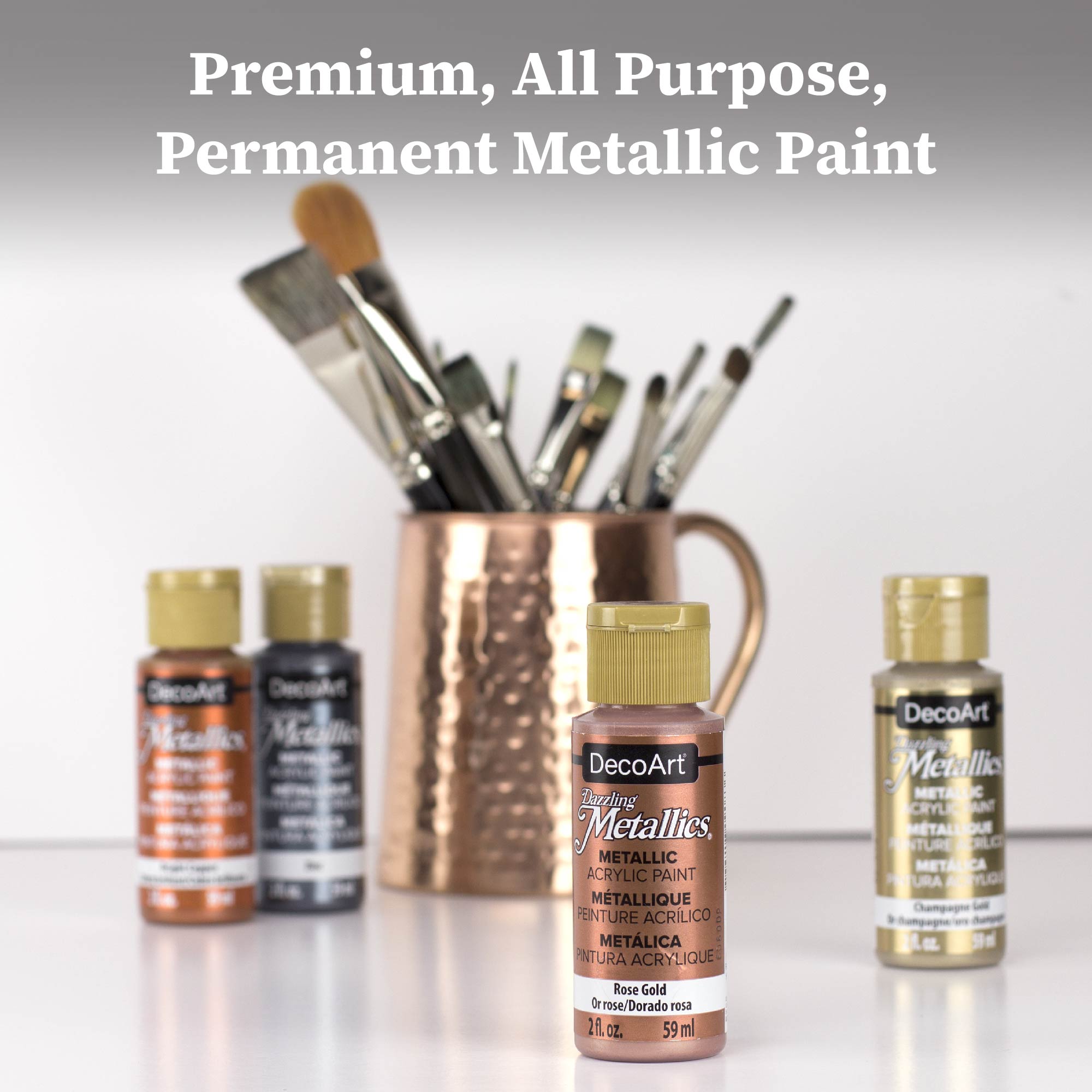DecoArt Dazzling Metallics acrylic paint set with 9 bold metallic colors in 2 fl oz bottles, ideal for arts and crafts projects.