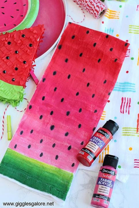 DecoArt SoSoft Fabric Paint in cadmium orange, 1oz bottle, suitable for soft, vibrant fabric designs and craft projects.