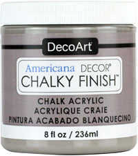DecoArt Americana Decor Chalky Finish in 8oz jar showing creamy white chalk paint for furniture and craft projects.