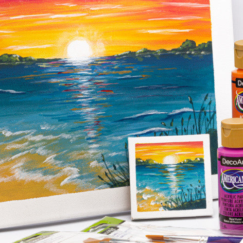 DecoArt Americana Acrylics oranges paint in a 2 oz bottle, showcasing vibrant orange color for arts and crafts projects.