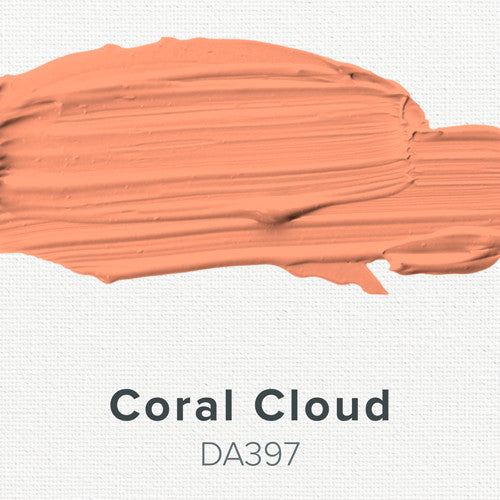 DecoArt Americana Acrylics Oranges paint in a 2 oz jar, featuring a vibrant peachy-orange color for artistic projects.