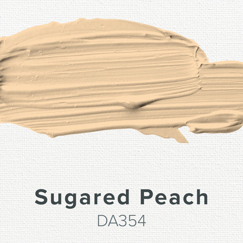 DecoArt Americana Acrylics in Peach and Cream, 2 oz bottles, vibrant orange and soft cream paint for arts and crafts projects.