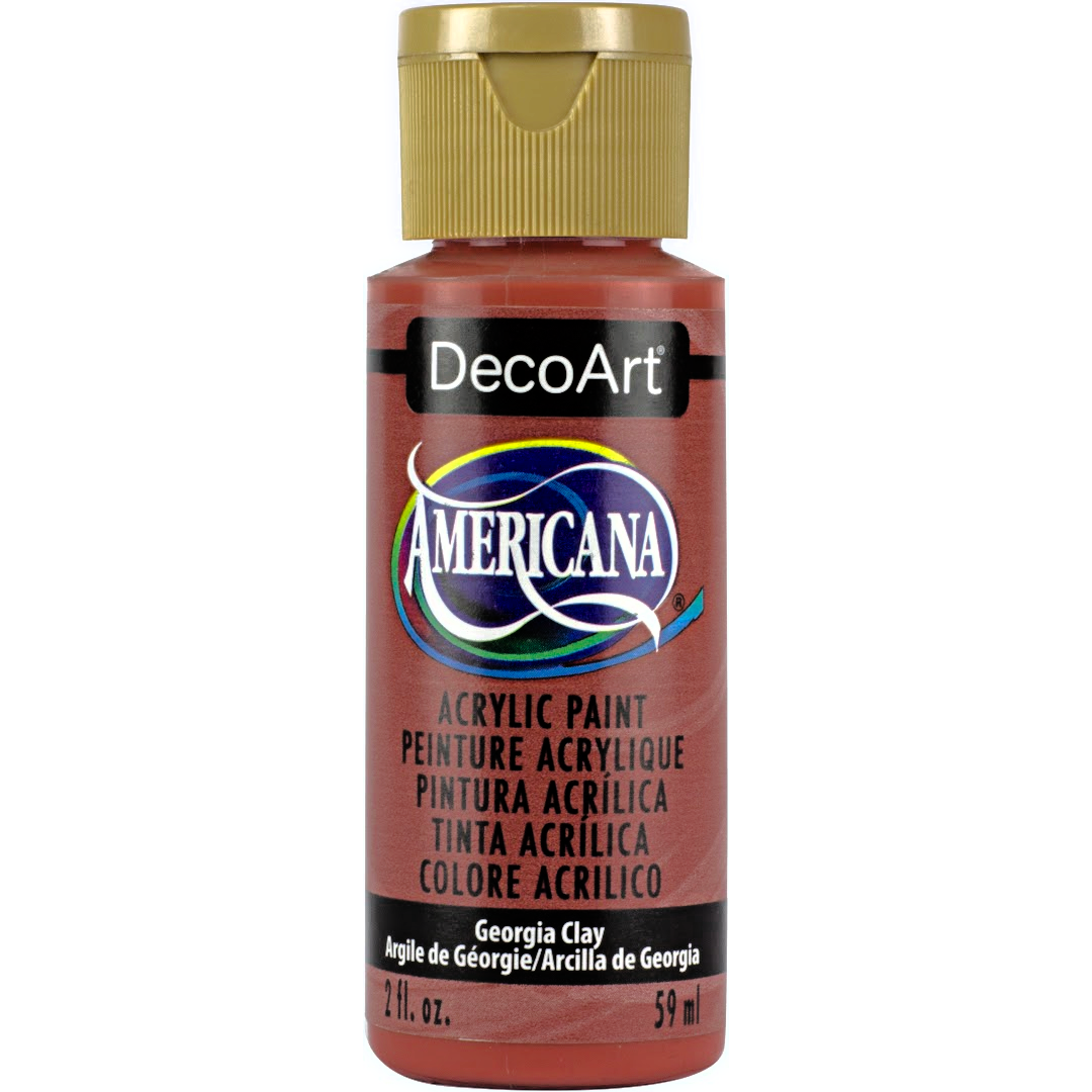 DecoArt Americana Acrylics Oranges paint bottle labeled Peaches n' Cream, 2 oz, with vibrant orange color for art projects.