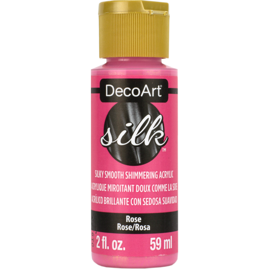 DecoArt Silk rose-colored fabric paint in 2 oz bottle, smooth and vibrant for crafting and fabric projects.