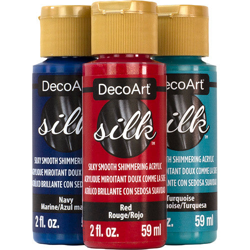 DecoArt Silk fabric dye in a 2 oz bottle, vibrant pink color, suitable for silk and textile coloring projects.