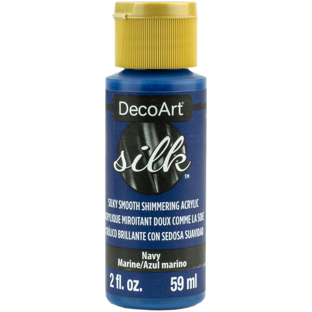 DecoArt Silk rose-colored fabric dye in a 2 oz bottle, showcasing smooth liquid consistency for vibrant textile coloring.