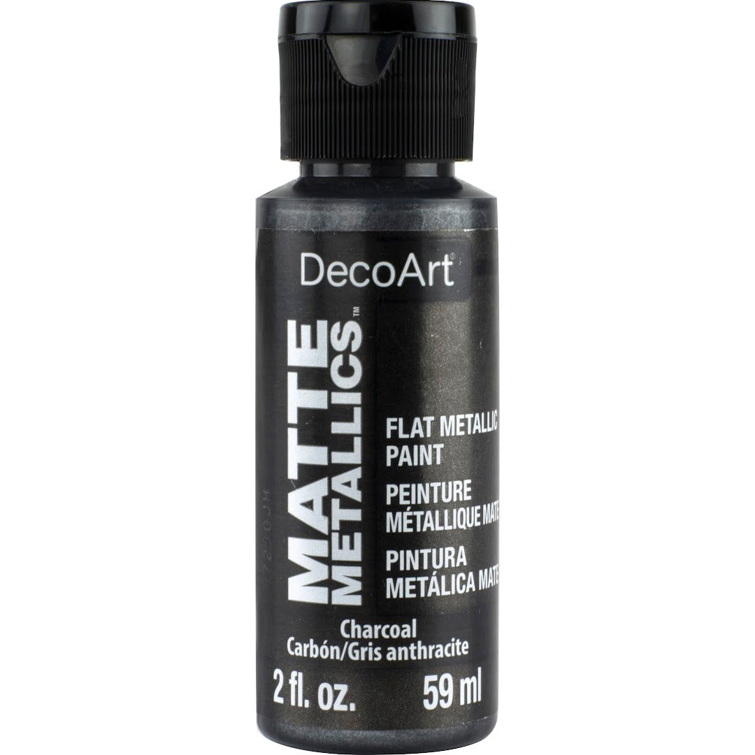 DecoArt Matte Metallics rose gold paint in a 2-ounce bottle with a smooth, metallic finish for craft and decorative projects.