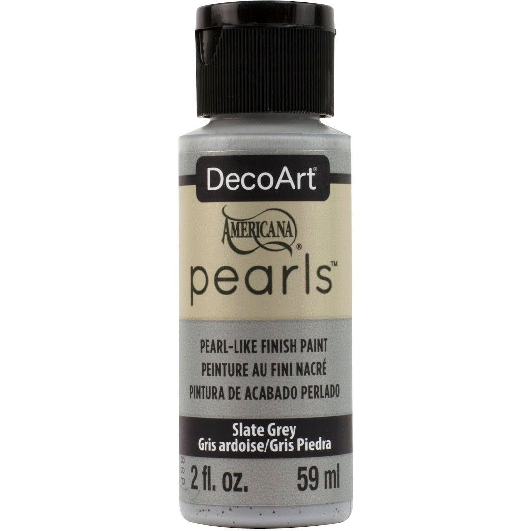 White DecoArt Americana Pearls in 2 oz bottle, showcasing smooth, round pearl beads for craft and DIY projects.