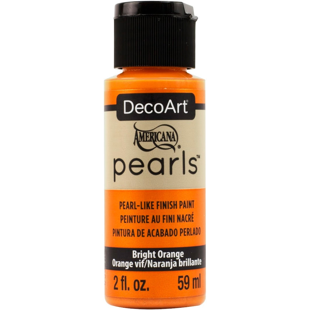 White DecoArt Americana Pearls in a 2 oz jar, showcasing smooth, round pearl-like craft embellishments for decorating projects.