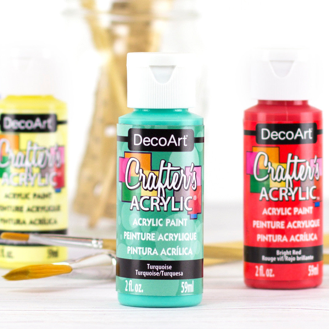 White DecoArt Crafter's Acrylic paint in a 2 oz bottle, suitable for crafting and artistic projects.