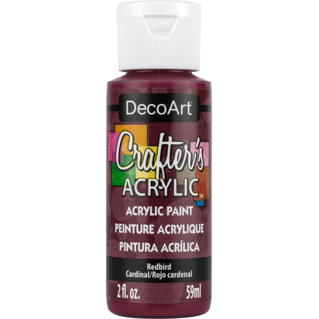 White Crafter's Acrylic paint by DecoArt in a 2 oz bottle, showing the product label and acrylic paint inside the bottle.