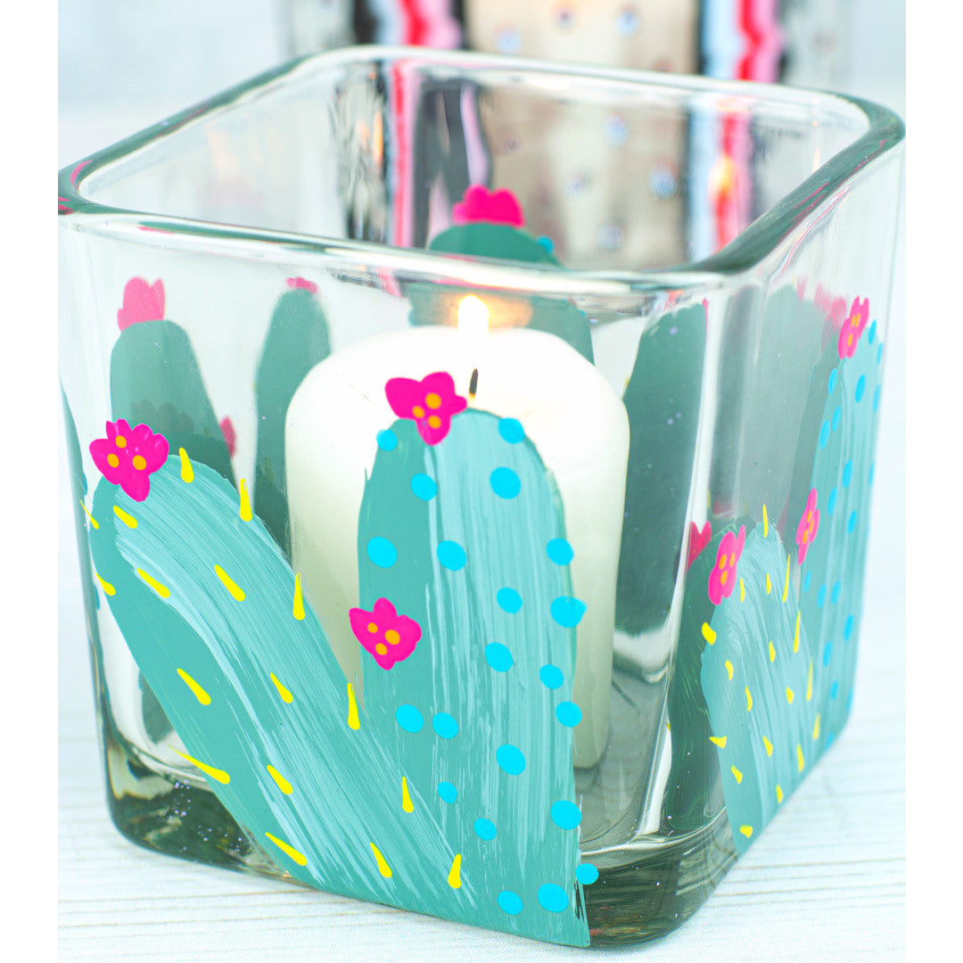 White DecoArt Glass Paint in a 2 oz bottle, suitable for decorating and customizing glass surfaces.